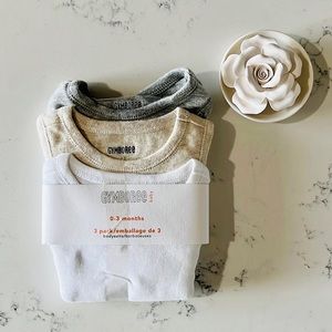 Gymboree set of three sleeves less baby’s onesies